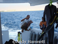 The good guys on the boat.  The little guy is Momo, 10 ye... by Andy Hamnett 